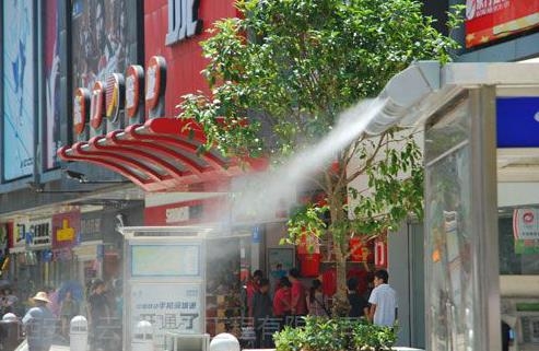 Bus stop mist cooling system